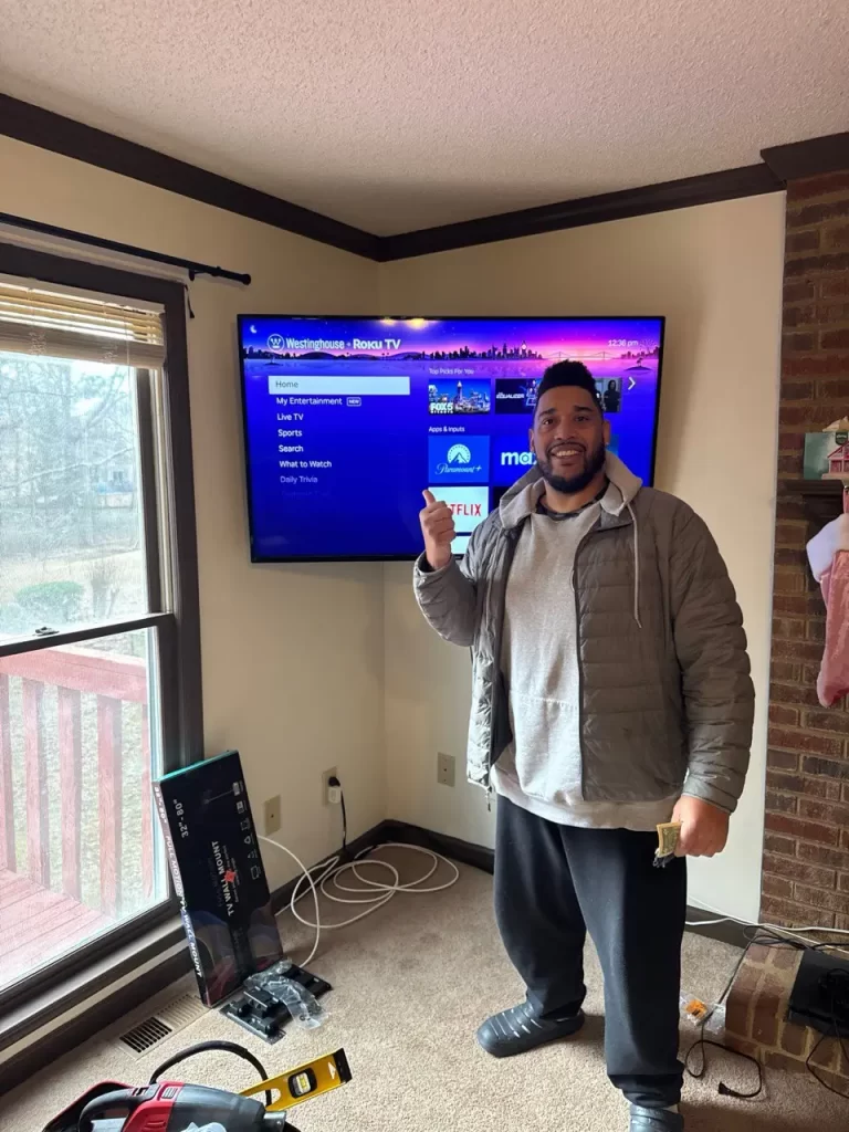 TV wall mounted in corner setup with Roku interface – Alpharetta installation