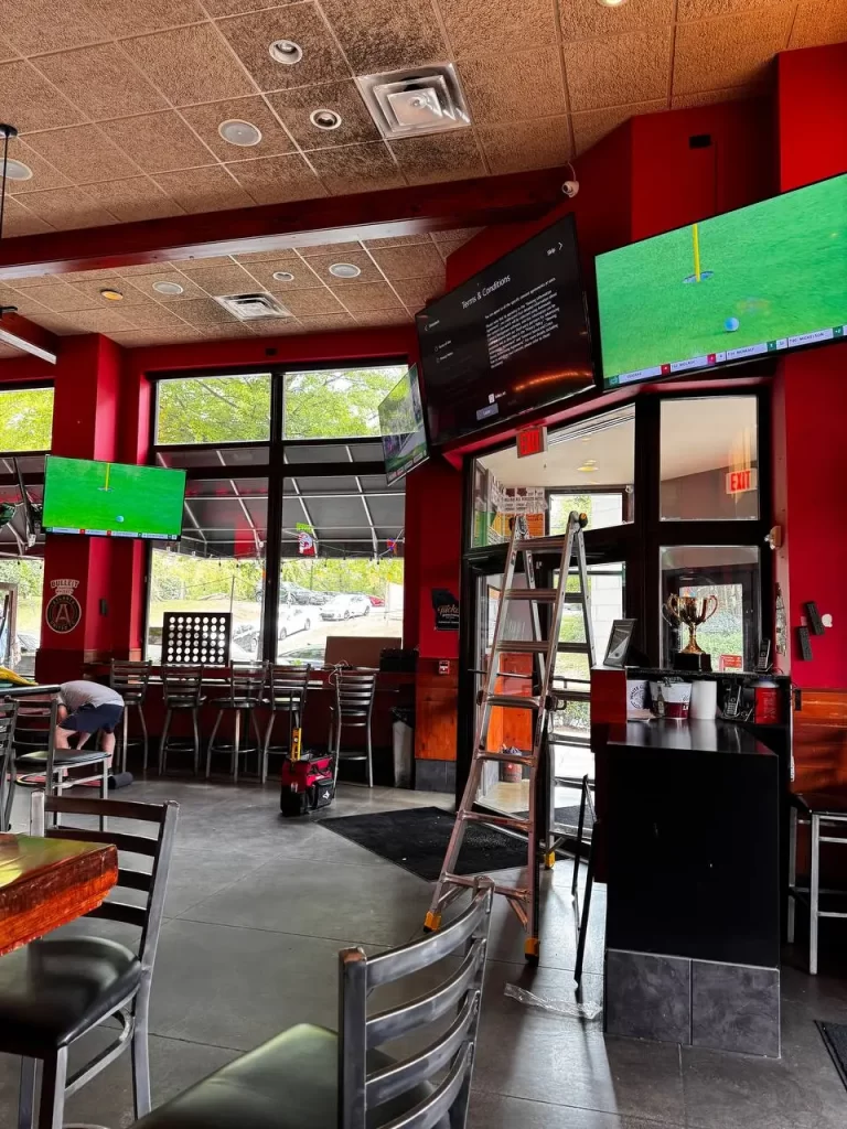 Commercial TV mounting in Atlanta bar – multi-screen setup