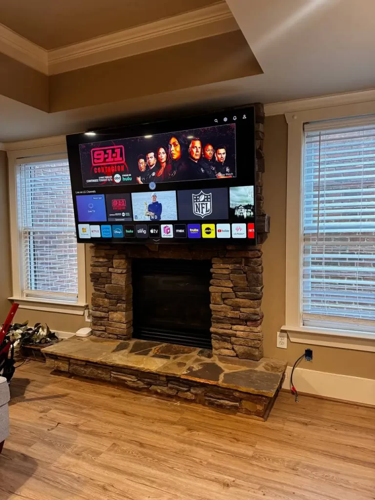 V installed above stone fireplace with streaming setup – Marietta, GA