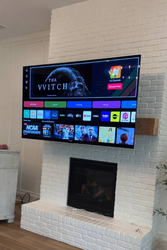 TV installation mantel mount on the wall in Atlanta