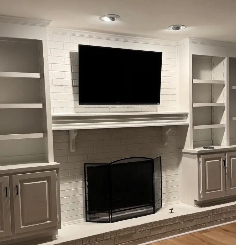 TV installed on a brick wall with secure wall mount and hidden wiring in Atlanta